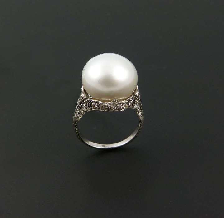 Antique single stone pearl and diamond ring